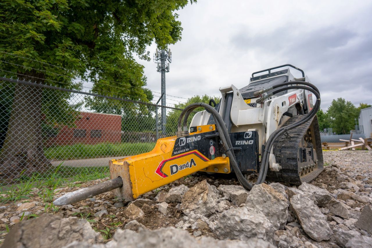 Hydraulic Hanmmer on a Mini SKid Steer