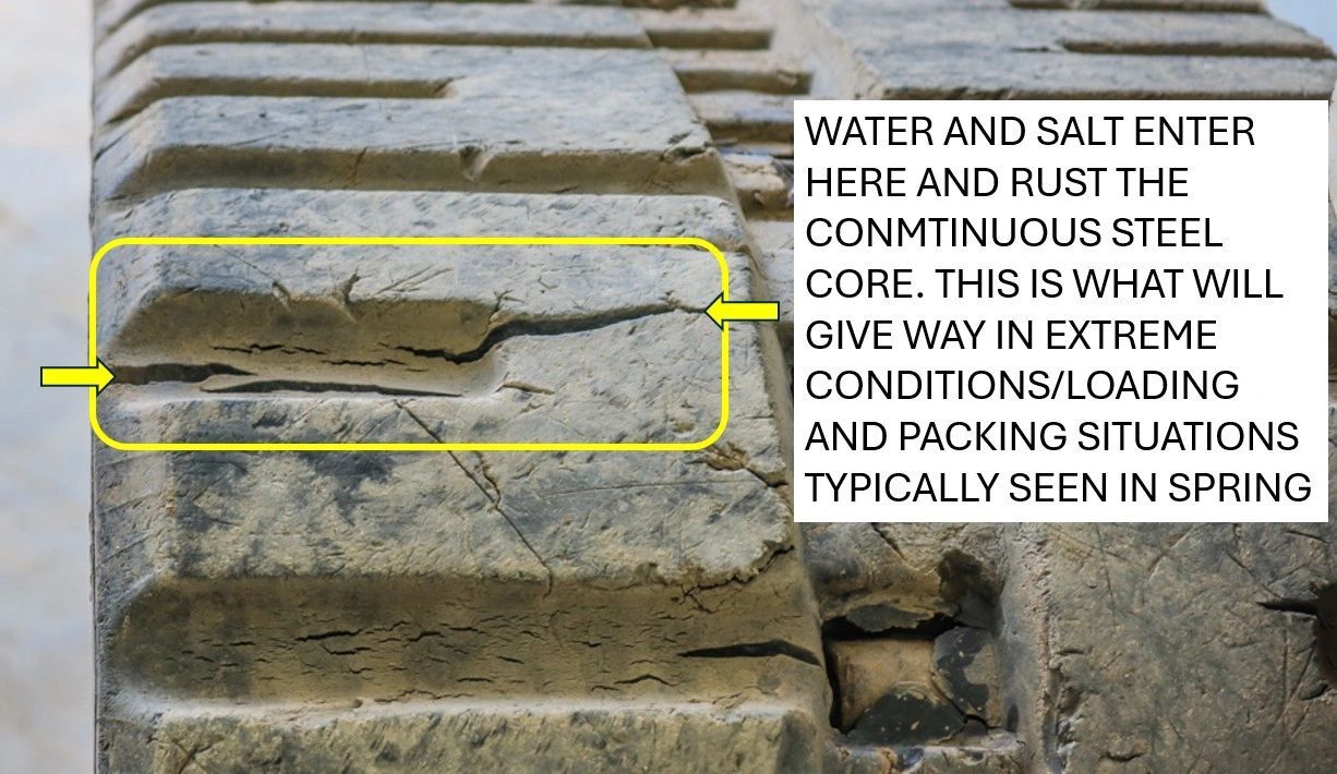 These are the cracks that really matter.  This image shows a crack that will allow water, and salt to enter into the track steel core and this will eventually break the track in two.